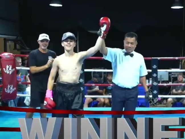 Birchell celebrates his pro boxing debut with a victory.