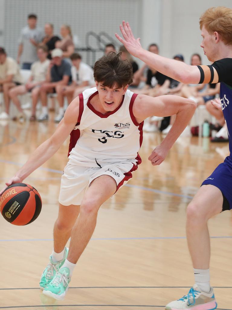 Basketball Australia Schools Championships at Carrara. Mens open final, Lake Ginninderra College Lakers V TSS (in white). the Lakers defence gave Benjamin Tweedy from TSS special attention in the final. Picture Glenn Hampson