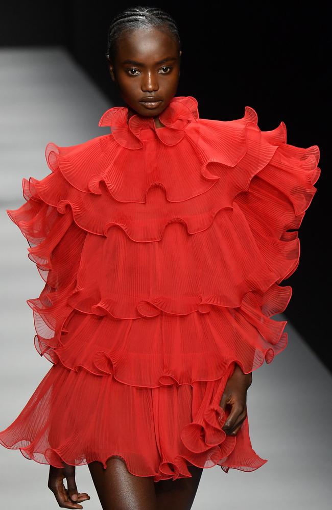 She’s red-y! After London Fashion Week, Agi Akur jetted to Milan for Alberta Ferretti. Picture: AFP