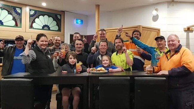 Locals at the King Island Hotel show off the “Go for Gold Stewy Parma” and “McSweyn Golden Sunset” cocktail.