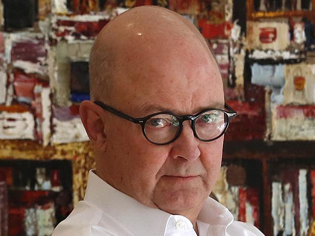 Former News Corp CEO Kim Williams poses for a photograph in front of a painting by Massimo Gianoni at his home in Queens Park. 24/8/2014 The Australian/Picture David Moir Interview by Sharri Markson