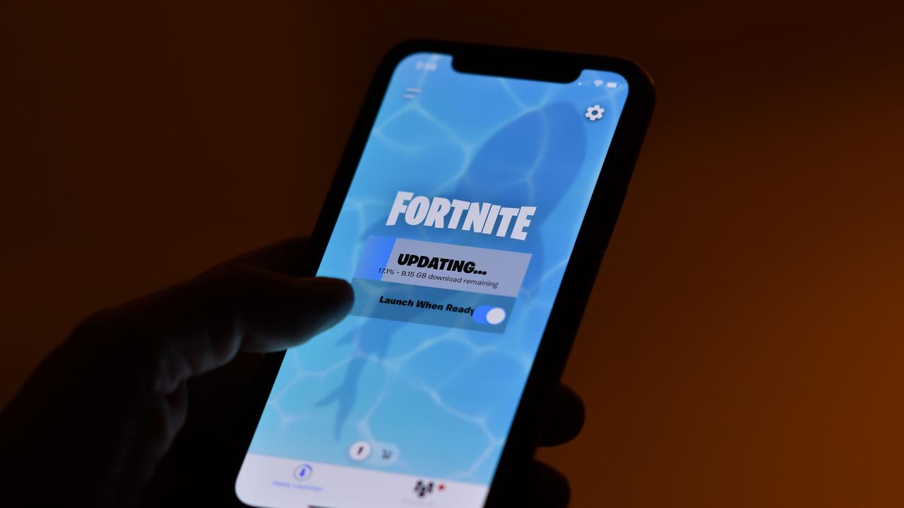 Apple and Google have pulled video game sensation Fortnite from their mobile app shops after its maker Epic Games released an update that dodges revenue sharing with the tech giants. Picture: Chris Delmas/AFP