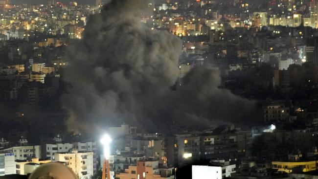 Smoke rises from an Israeli airstrike on Dahiyeh, in the southern suburb of Beirut, Lebanon, early Friday, Oct. 25, 2024. (AP Photo/Hussein Malla)