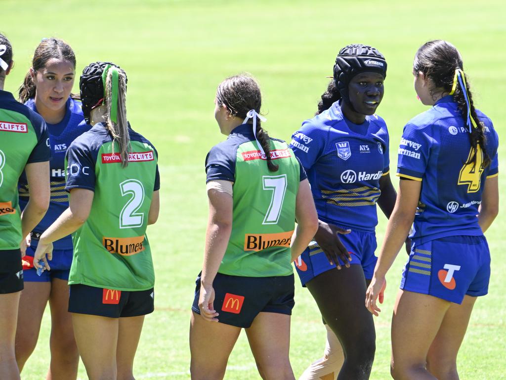 Evelyn Kuwendu (headgear). Picture: Martin Ollman