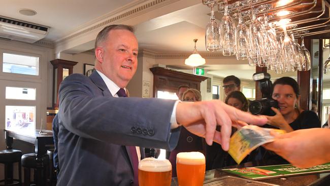 Opposition Leader Anthony Albanese buys beer at the Unity Hall Hotel in Balmain, Sydney. Picture: AAP