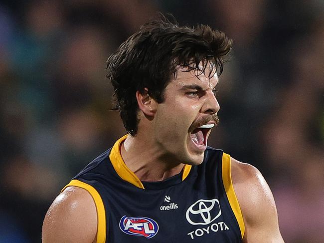 ADELAIDE, AUSTRALIA – AUG 17: Darcy Fogarty of the Crows celebrates a goal during the 2024 AFL Round 23 match between the port Adelaide Power and the Adelaide Crows at Adelaide Oval on August 17, 2024 in Adelaide, Australia. (Photo by Sarah Reed/AFL Photos via Getty Images)