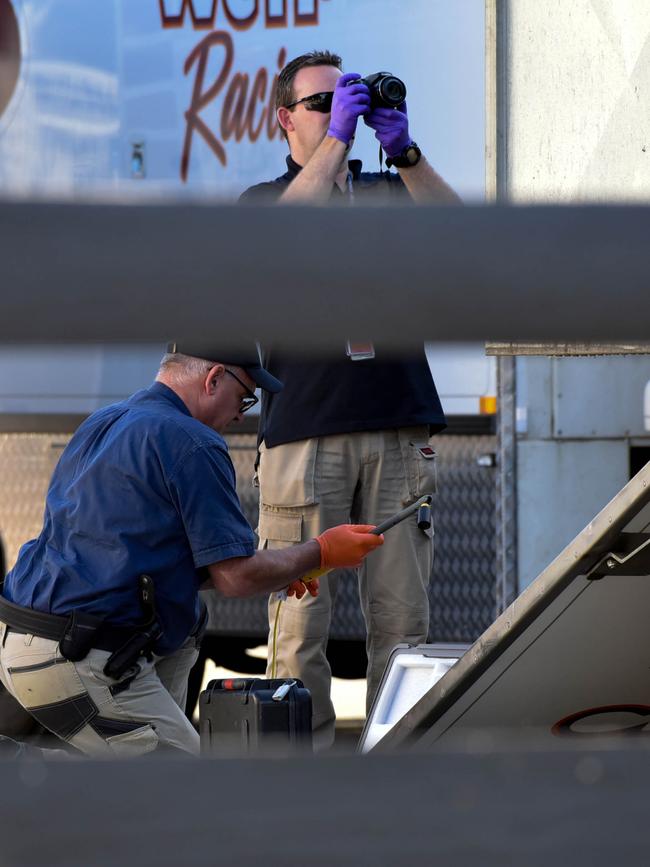 Police take pictures at Weir’s property. Picture: Ian Wilson