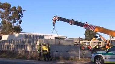 A teenager has suffered a serious leg injury after a concrete slab fell 3m at workplace in Edinburgh North. Picture: 7NEWS