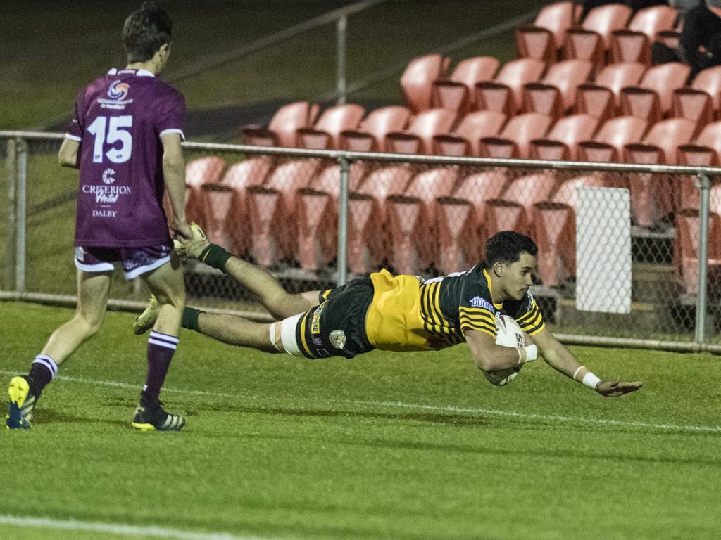 Warren Draper gets a try for Wattles. Picture: Kevin Farmer.