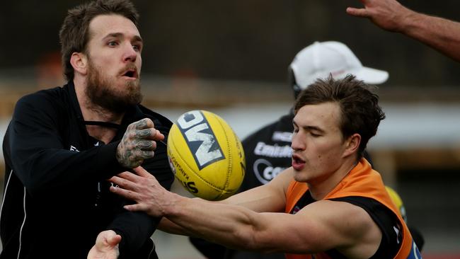 Kyle Martin and Dane Swan at a Collingwood training session in 2014.