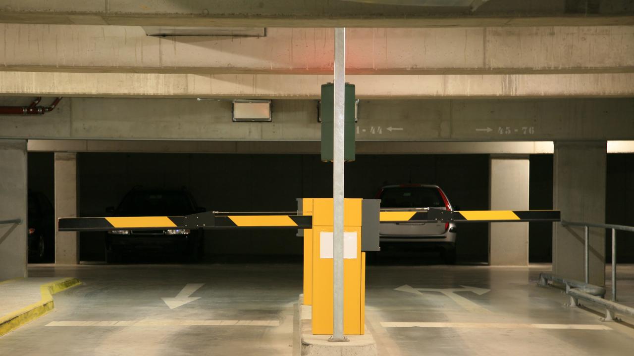 One 22-year-old uni student has avoided ever having to pay for parking by following the car in front out of the boom gate.