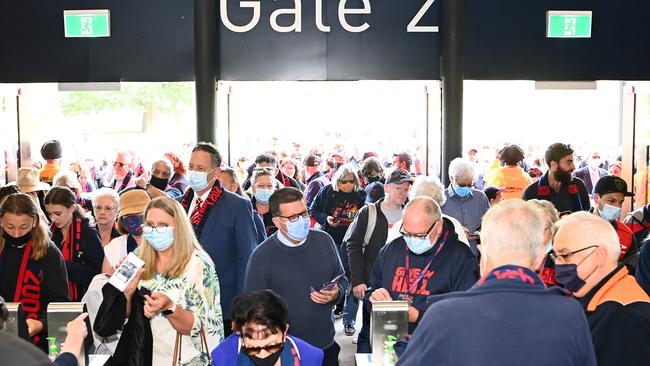 Demons fans flock through Gate 2 of the MCG. Picture: Getty Images