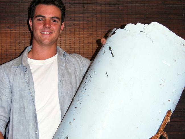 Liam Lotter with his metre-long piece, which is stamped with zone reference 676EB, identifying it as part of the inboard support fairing for the outboard trailing edge flap of a Boeing 777.