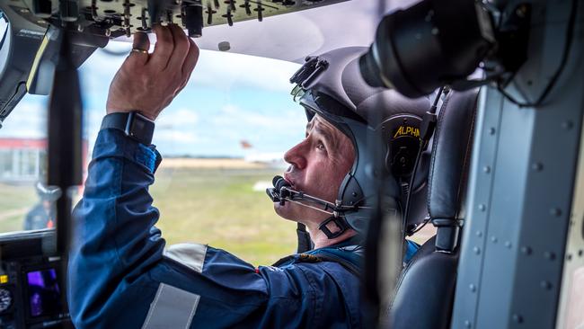 Westpac Lifesaver Rescue Helicopter Service. Pilot Adam Lantz prepares for takeoff. Picture: Jake Nowakowski