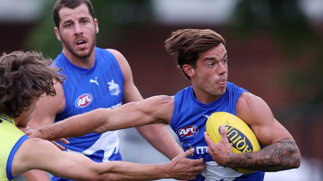 Jy Simpkin in action during a training drill at Arden Street. Picture: Mark Stewart