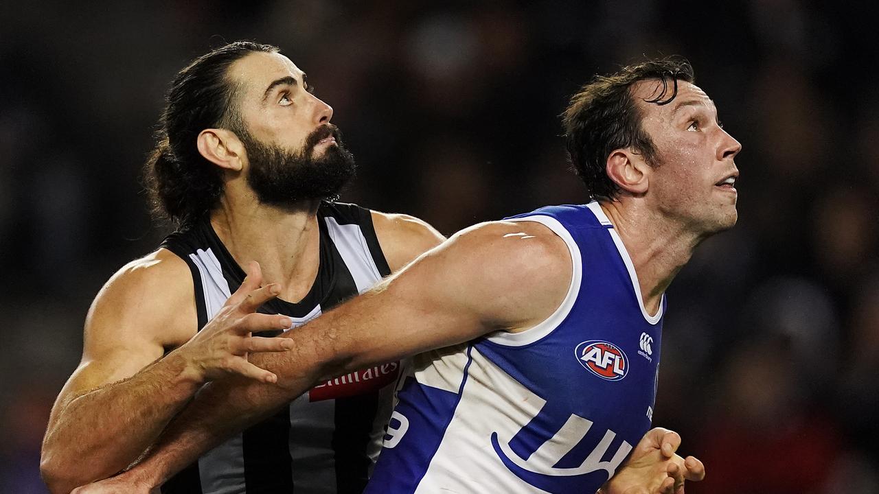 Todd Goldstein and Brodie Grundy compete at Marvel Stadium.