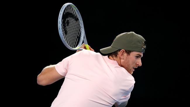 Harry Bourchier of Australia plays a backhand in his Men's Singles first round match against Marc Polmans of Australia during day one of the ATP 250 Murray River Open at Melbourne Park on February 01, 2021 in Melbourne, Australia. (Photo by Jack Thomas/Getty Images)