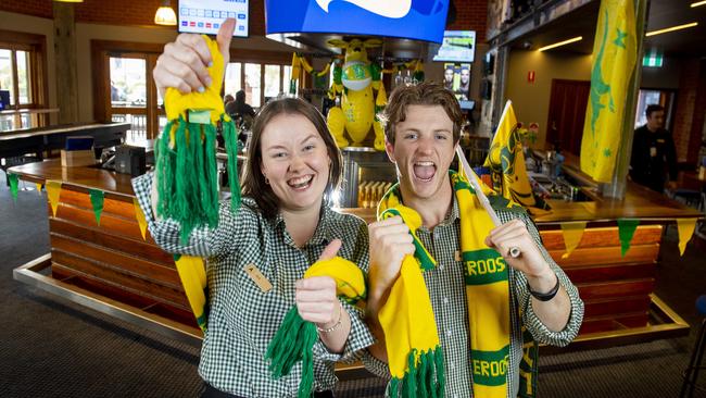 Bar tenders Ela Walsh and Luke Giacometti get into the Matilda's spirit at Arkaba's newly refurbished sports bar 'SPORTYS'-where they will have the Matilda's on the big screen Friday night. Picture Mark Brake