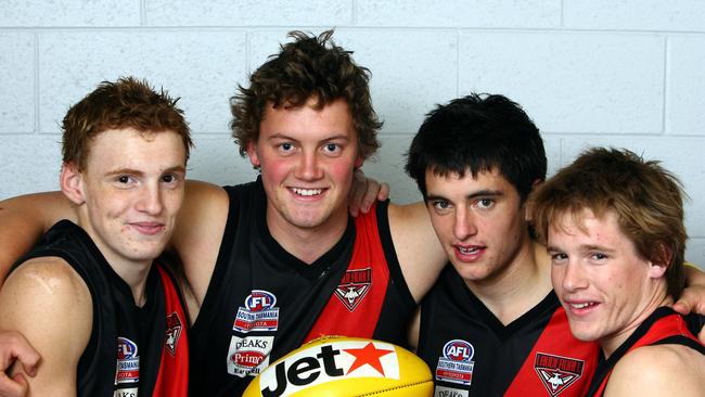 Former Lauderdale midfielder Mitch Robinson (far left) could return to the Bombers for the 2024 TSL season. Pictured here in 2007 with former teammates Tom Brennan, Alex Hevey and Ben Rodgers. Picture: Raoul Kochanowski.