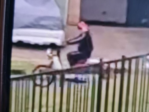 One of the men allegedly jumped on the roof and bonnet of a police car before fleeing on a 'postman style scooter'. Picture: Campbelltown Police