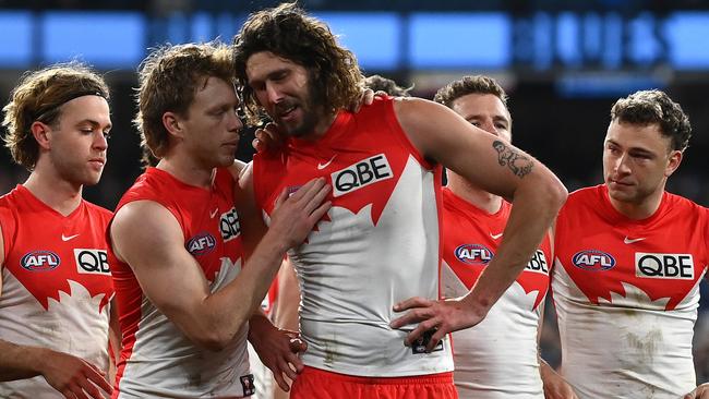 Tom Hickey walks off after his final AFL game. (Photo by Quinn Rooney/Getty Images)