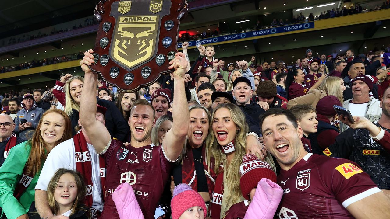 Daly Cherry-Evans celebrates with Ben Hunt after Queensland’s State of Origin series win. Picture: Adam Head