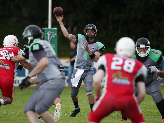 Quarterback Brendan Kruger makes a pass in the NQ Gridiron match between the Cairns Falcons and the Townsville Cyclones, held at Vico Oval, Mooroobool. Picture: Brendan Radke