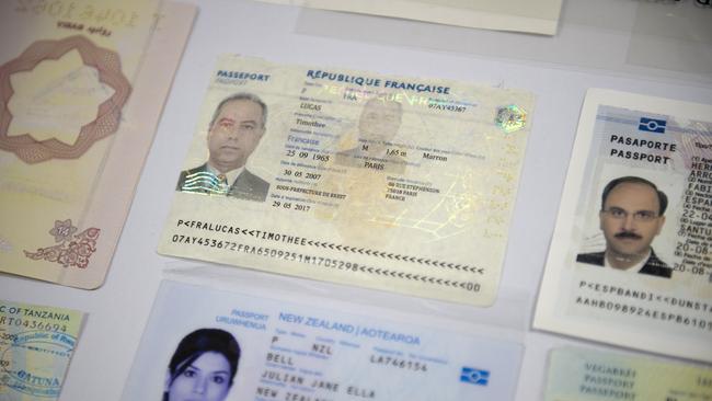 Fake passports are displayed at the immigration bureau in Bangkok.