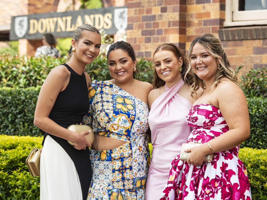 Graduates (from left) Meg Combarngo, Nina McAndrew, Libby White and Eden Fechner as Downlands College year 12 students come together for their valedictory mass at the college, Saturday, November 16, 2024. Picture: Kevin Farmer