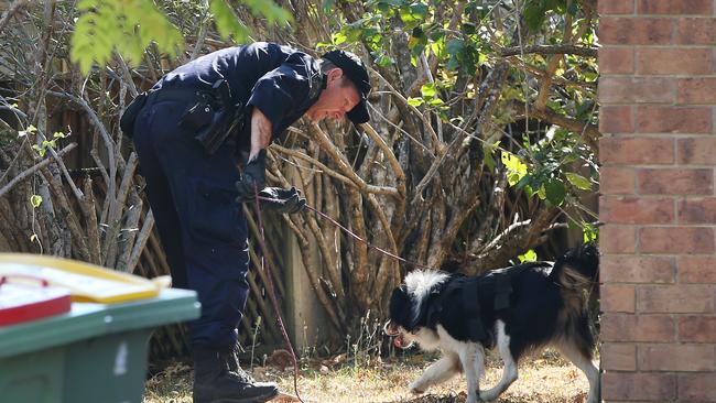 Police spent much of the day at the home in Renfrew Drive, Highland Park. Picture: Glenn Hampson