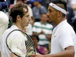 Andy Murray of Britain (left) shakes hands with Nick Kyrgios of Australia after beating him in their men's singles match at Wimbledon in July. Picture: Kirsty Wigglesworth