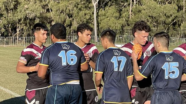 Dom Sandow, middle, and team mates shake hands with Mabel Park players.