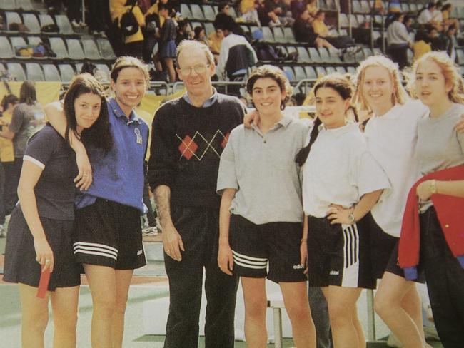 Mr Hawley with students in the 1990s.