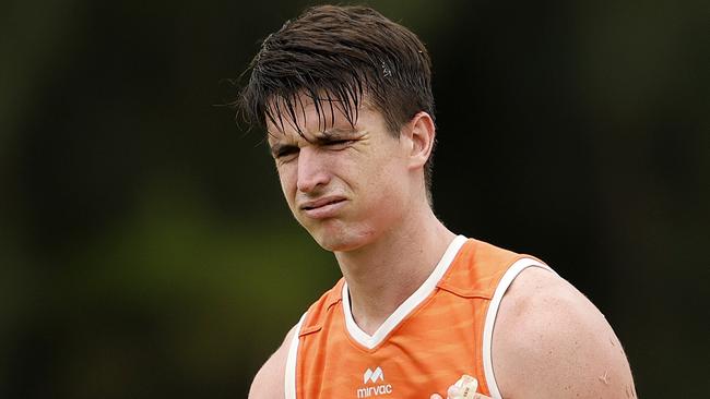 Sam Taylor after a heavy collision with Aaron Cadman and Jesse Hogan during the GWS Giants match simulation training session on February 14, 2025. Photo by Phil Hillyard (Image Supplied for Editorial Use only - **NO ON SALES** - Â©Phil Hillyard )