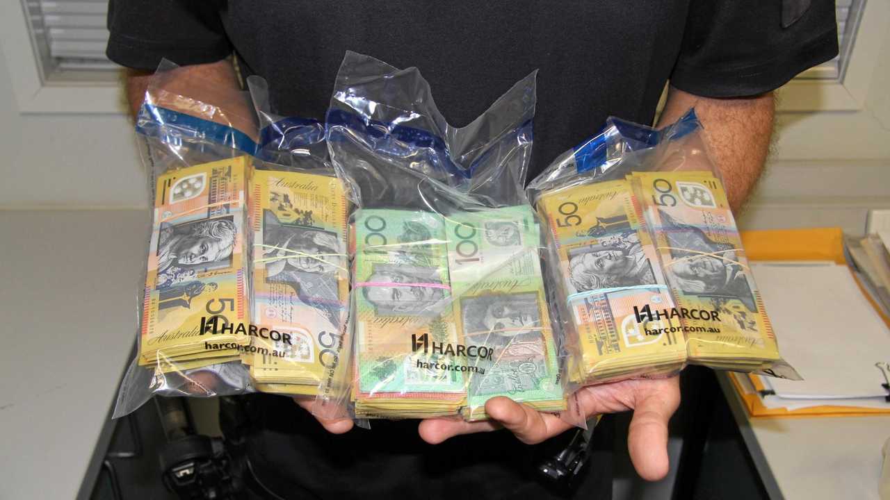 $80,000 cash was found concealed in a car, in a bust led by Sgt Sebastian Pollock. Picture: Roma Road Policing Unit