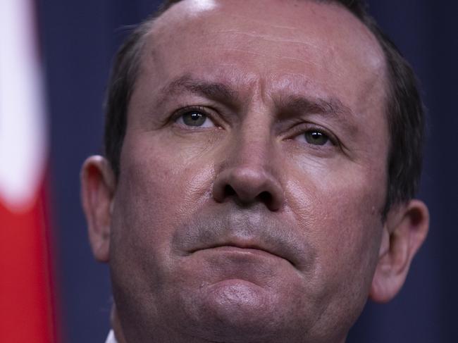 PERTH, AUSTRALIA - JUNE 29: West Australian Premier Mark McGowan speaks to media at Dumas House on June 29, 2021 in Perth, Australia. Lockdown restrictions have come into effect across the Perth and Peel regions for the next four days, following the confirmation of new community COVID-19 cases linked to the highly contagious Delta variant of the coronavirus. From midnight, residents in the Perth and Peel regions are only permitted to leave their homes for essential reasons, including purchasing essential goods, receiving medical care, or caring for the vulnerable. People may leave home to get vaccinated or to exercise within a 5-kilometre radius of their home. Weddings are restricted to five people, funerals to 10 people while gyms, beauty and hair salons, casinos and nightclubs must close. (Photo by Matt Jelonek/Getty Images)