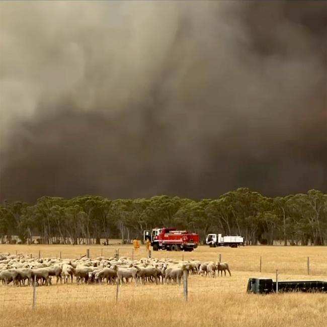 A Lexton CFA crew watch a bushfire burning in the Grampians. picture: Lexton CFA / Facebook