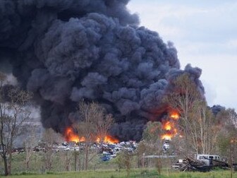 Firefighters battled a massive fire in a scrap metal car yard at Trenayr. Picture: Jackson Whitney