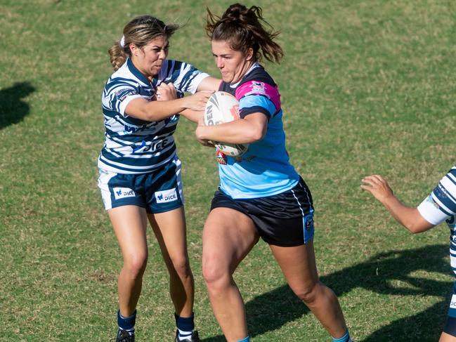 NRL NT Women's Premiership. Sistaz v Northern Sharks. Lauren Linton fends off Talia Corrie.Picture: Che Chorley