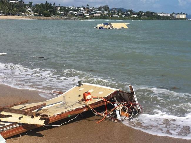 Several vessels washed up on the Airlie Beach foreshore on the weekend. Picture: VMR Whitsunday