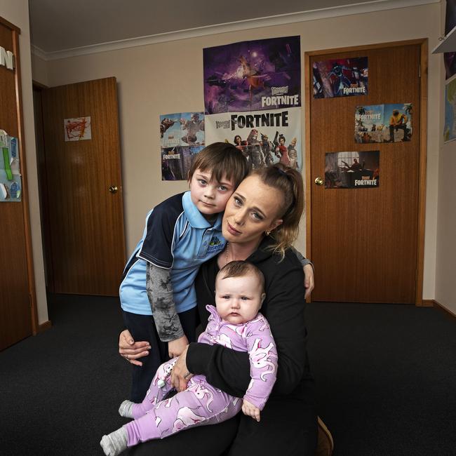 Montrose Housing Tasmania resident Jasmine Garrett with her children Kaiden McHenry, 7, and Remi Gueston, 6 months. Picture CHRIS KIDD