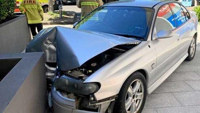 A woman has escaped injury after crashing her car into a wall in Tweed Heads.