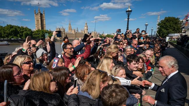 King Charles III meets members of the public in the queue along the South Bank, near to Lambeth Bridge.