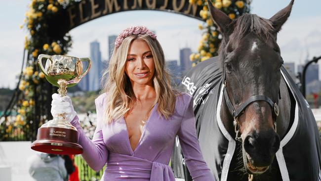 Melbourne Cup Carnival ambassador Nadia Bartel with 2000 Melbourne Cup winner Brew at the carnival’s launch this week. Picture: David Crosling