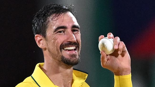 Mitchell Starc got the Aussies off to a flying start. (Photo by R.Satish BABU / AFP)