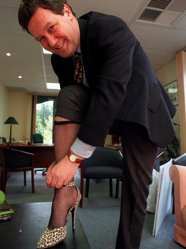 Does he regret this photo? Then-Foreign Minister Alexander Downer wears a fishnet stocking and a high-heeled shoe to promote The Rocky Horror Picture Show - and to raise money for charities through Variety.