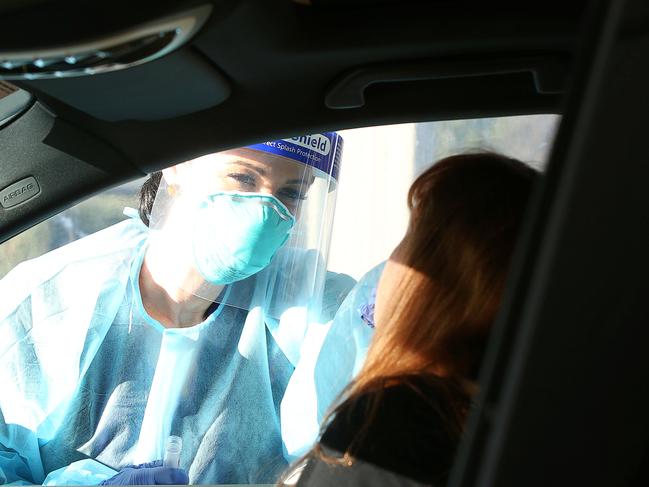 Australian Clinical Labs team members Sarah White prepares to begin screen in Geelong West. The labs will open a drive through COVID-19 testing site on the corner of Pakington St and Aberdeen St from Monday. Picture: Alan Barber