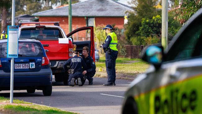 Rhyce Harding’s red ute being inspected by police. Picture: Justin Lloyd