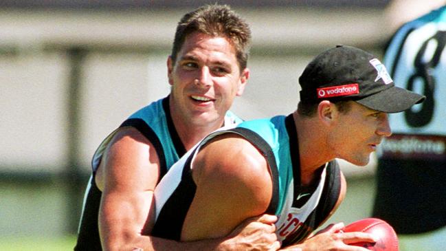 Footballer Adam Kingsley with Brett Montgomery at Port Adelaide Power training at Alberton Oval 12 Mar 2003.