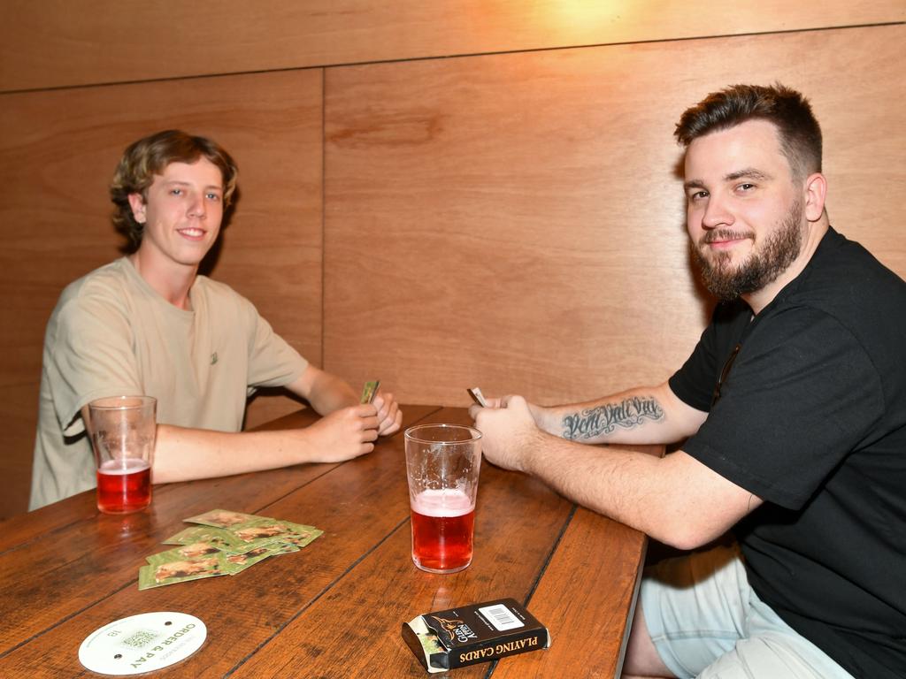 Australia Day celebrations: Matt Mortimer and Sebastian Peachey playing cards on their day off at the Sherwood Hotel in Lismore.